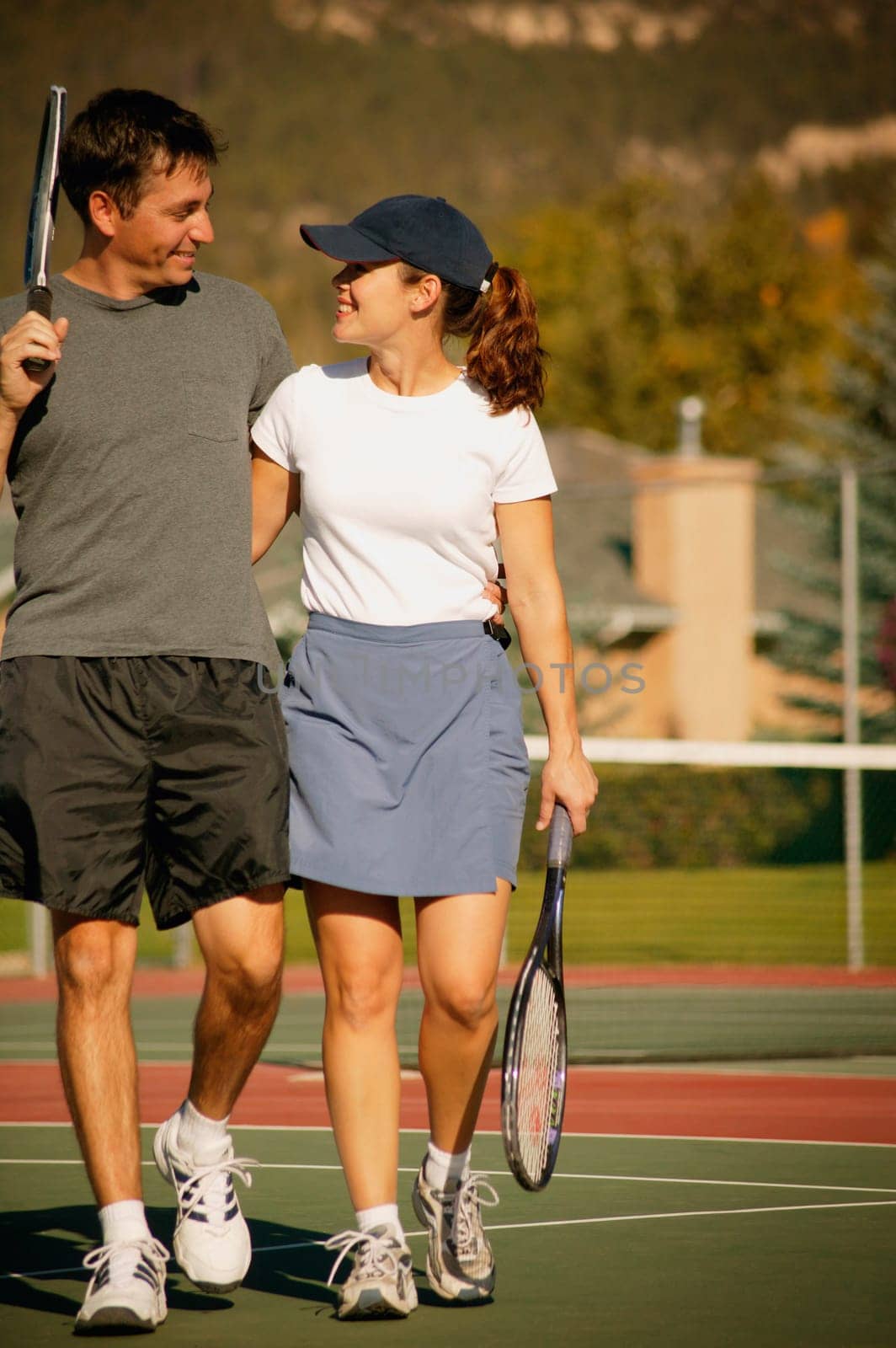 Couple in tennis courts