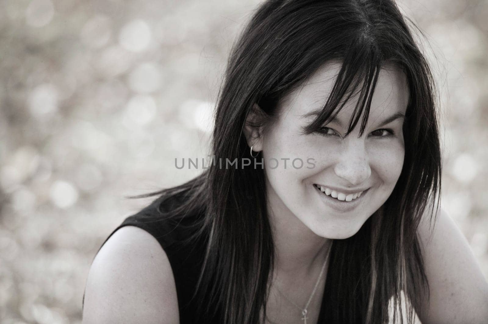 A woman smiles