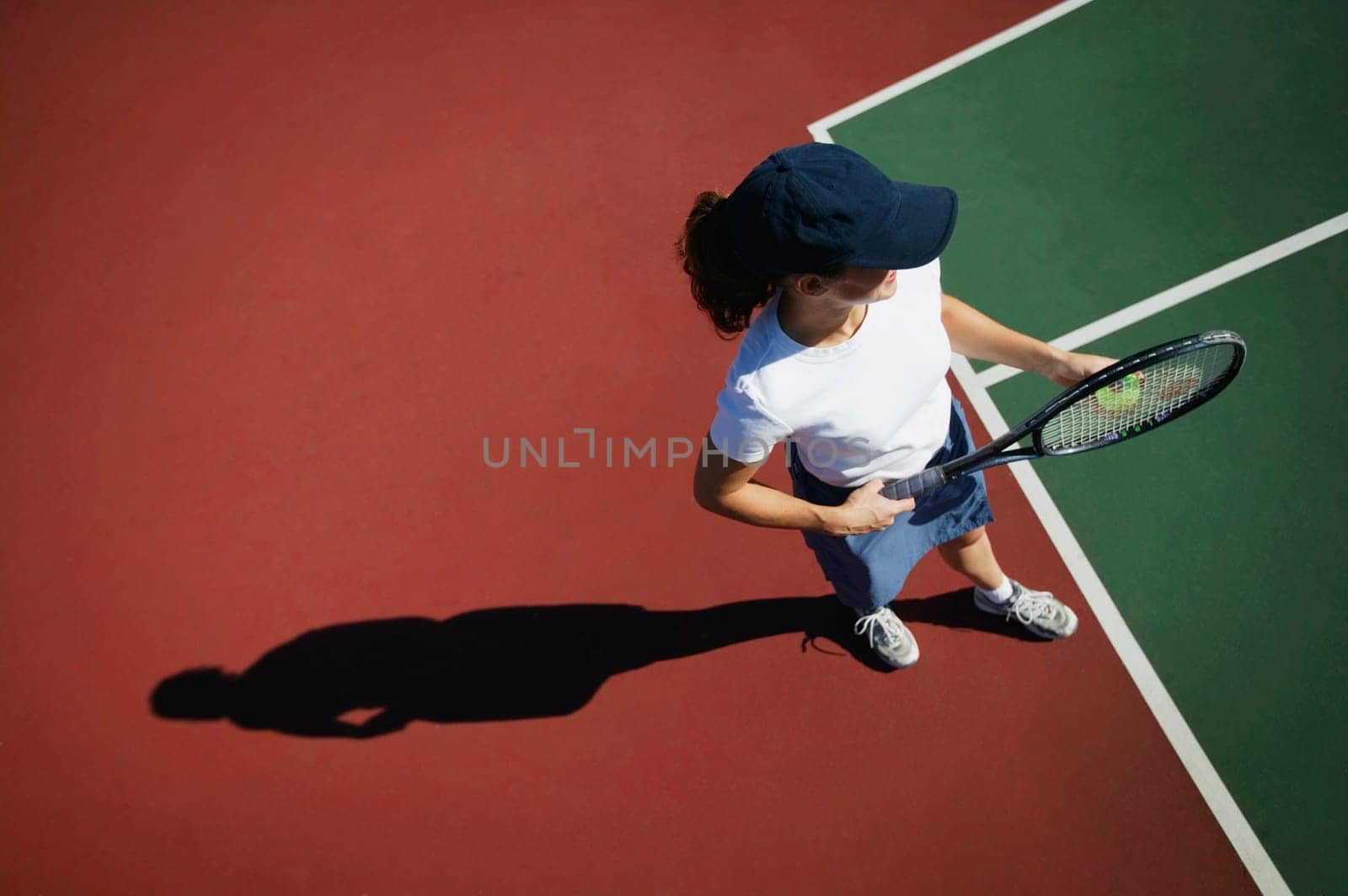 Woman plays tennis