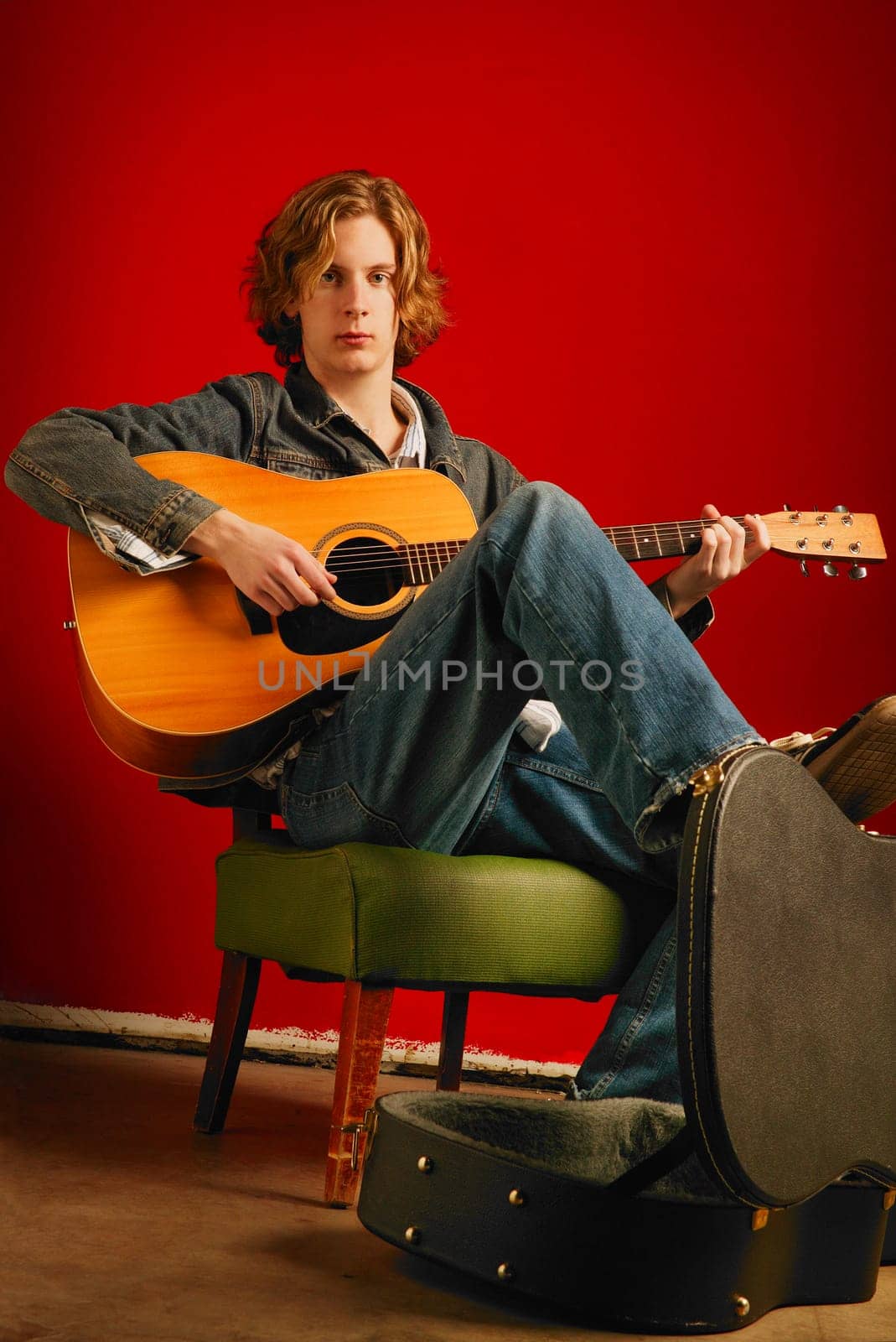 Man plays guitar