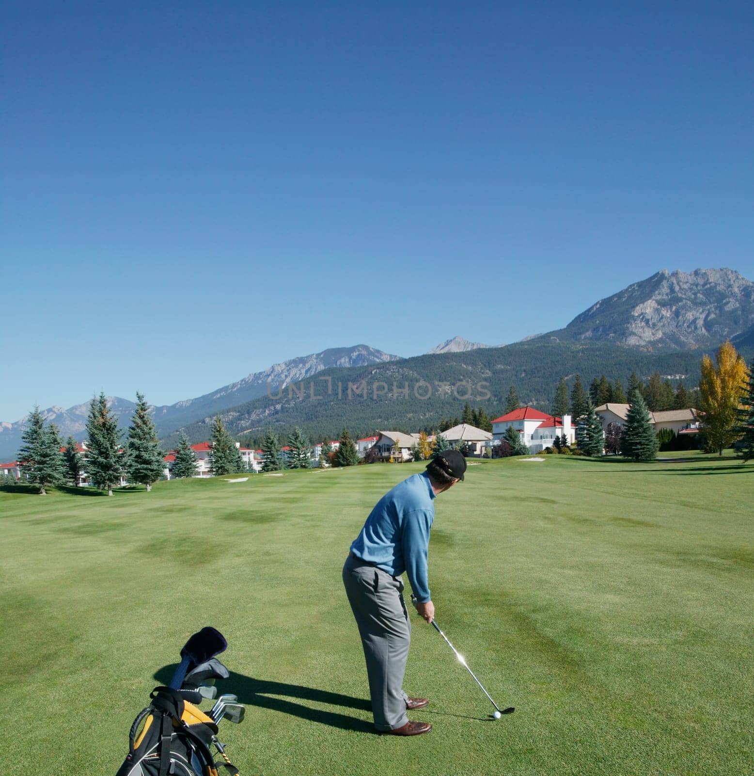 Man playing golf