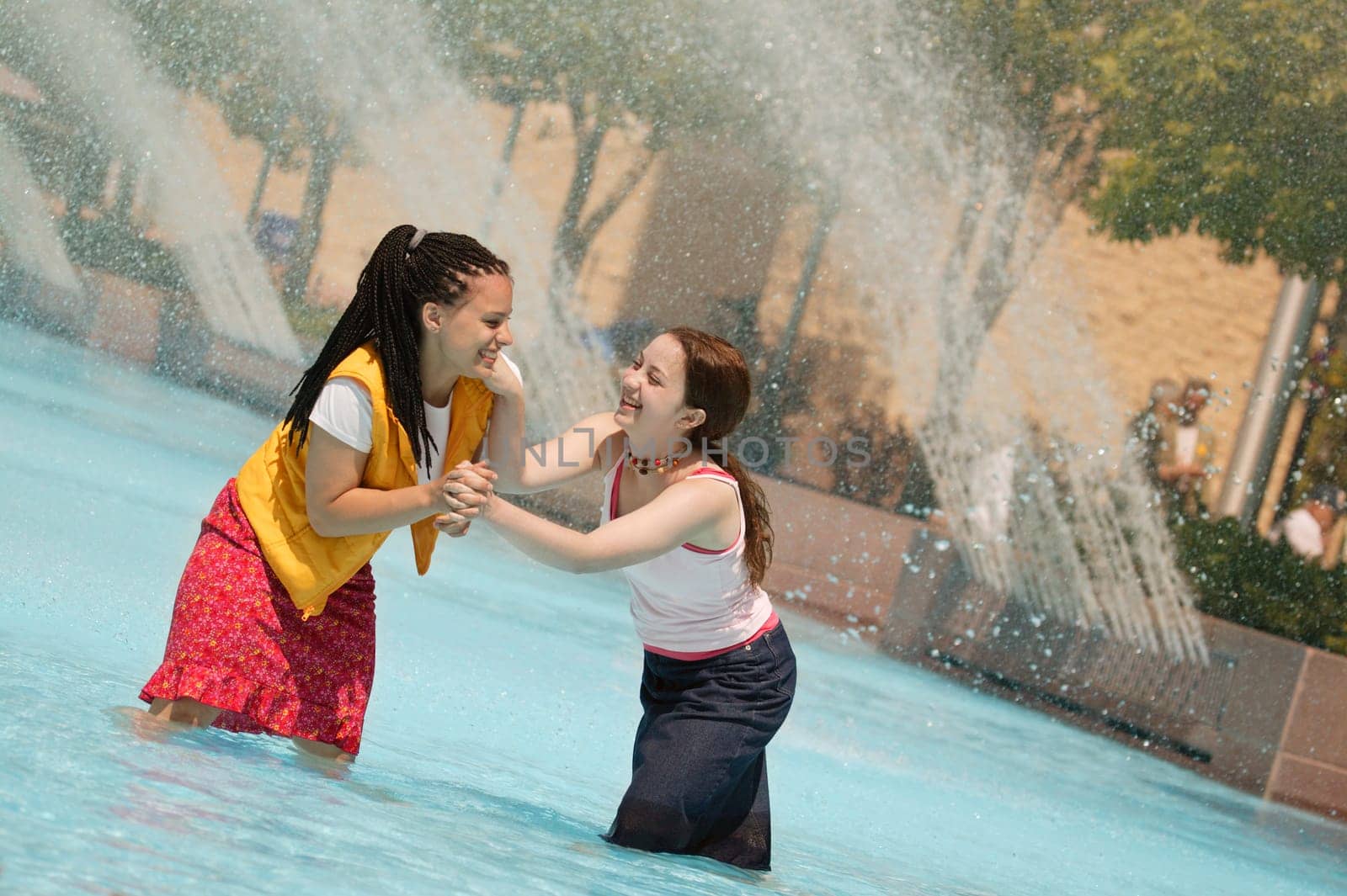 Girls have a water fight