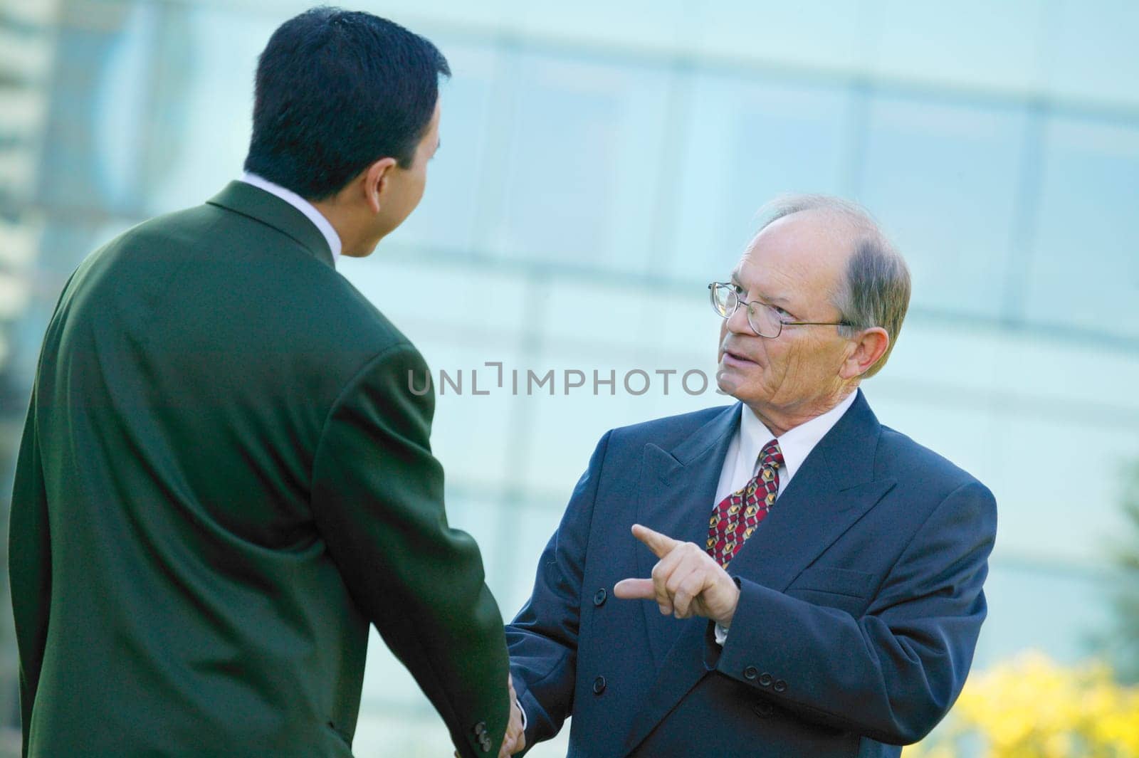 Businessmen shake hands