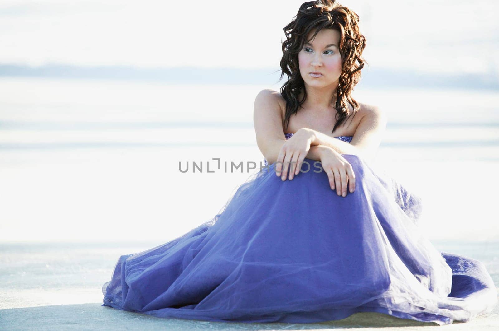 A woman with a blue gown