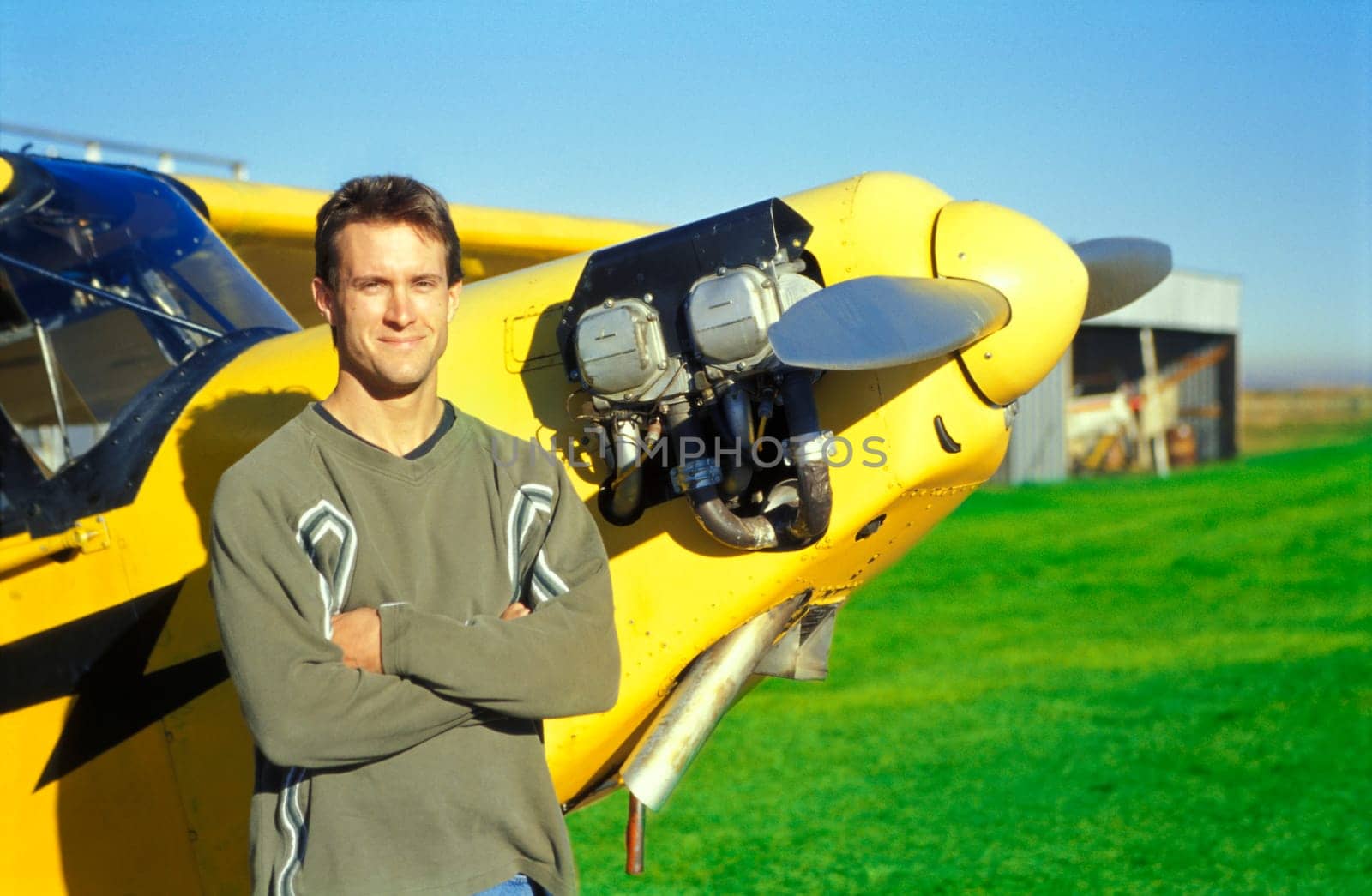 Pilot with his airplane