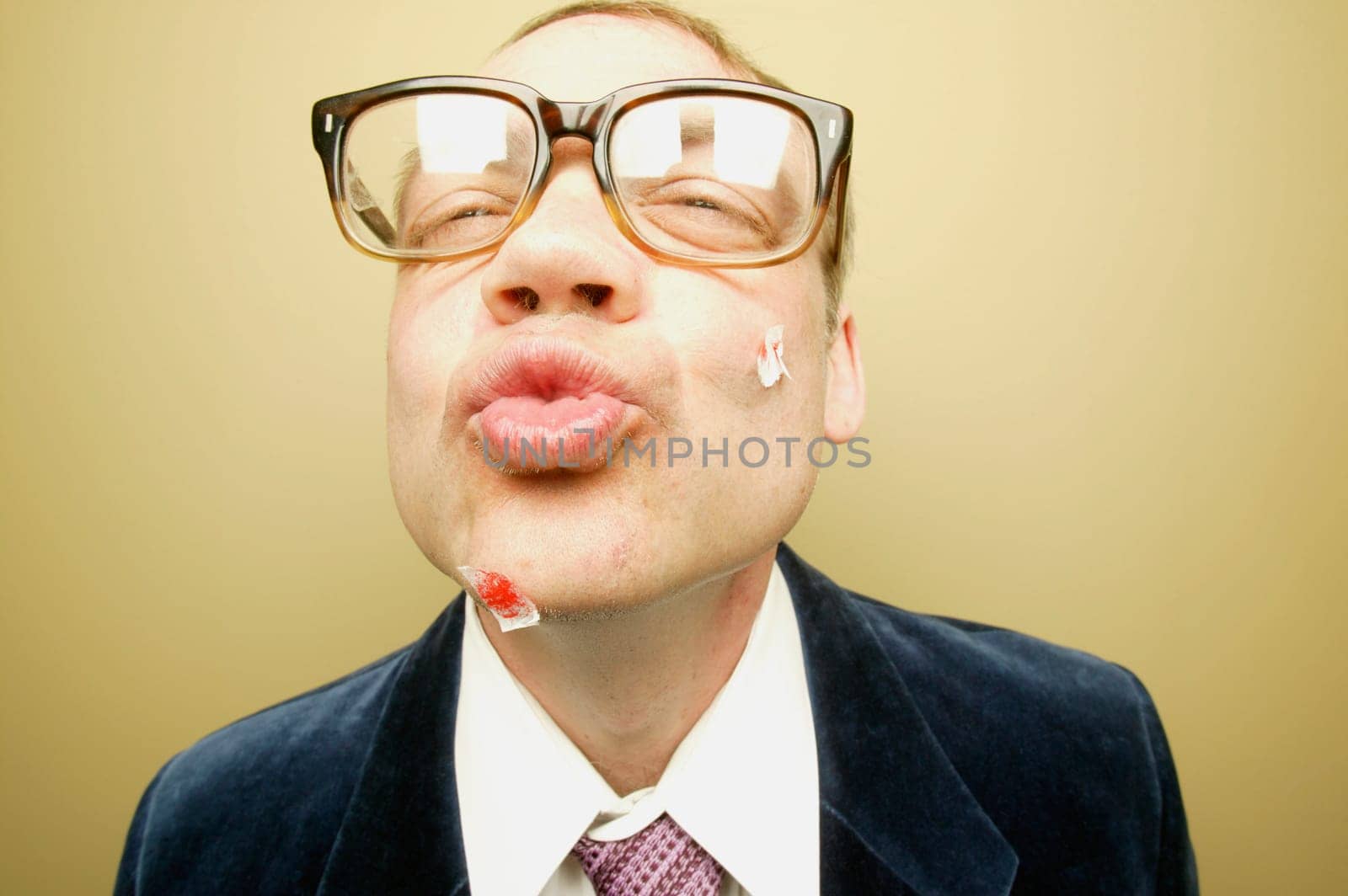 A man puckering
