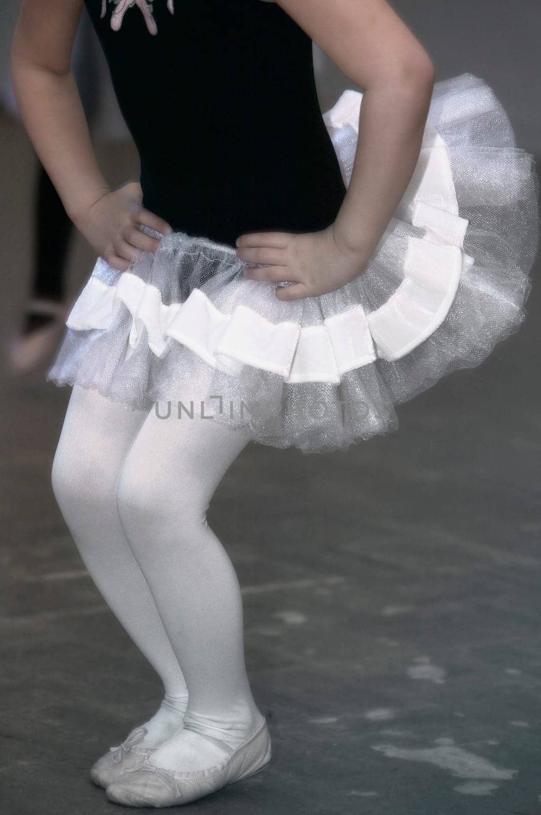 A child practices ballet