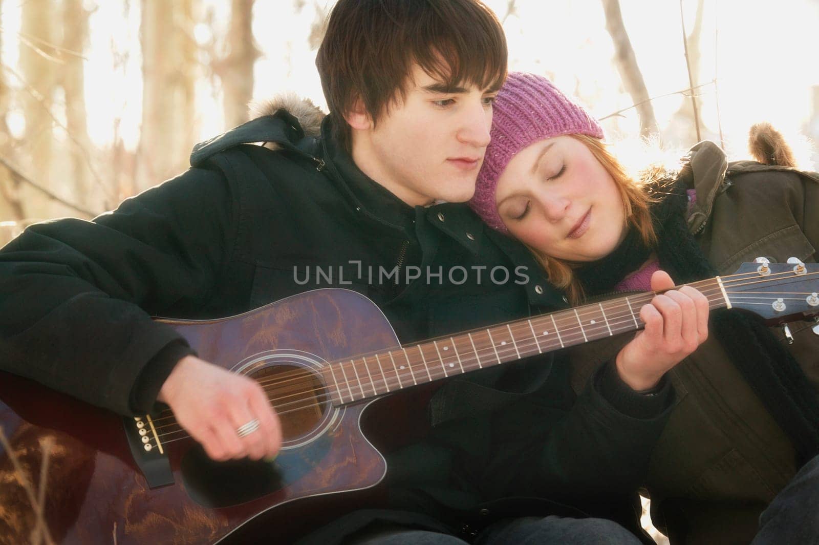 Man plays guitar