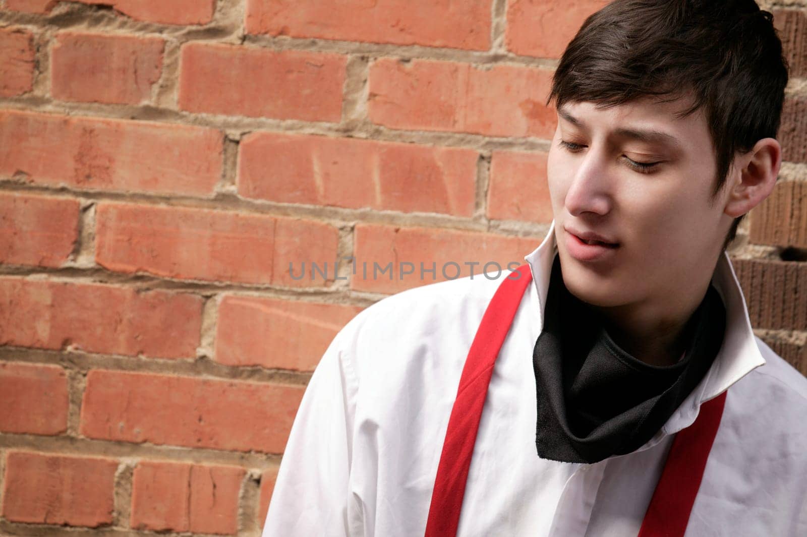 Man with red suspenders