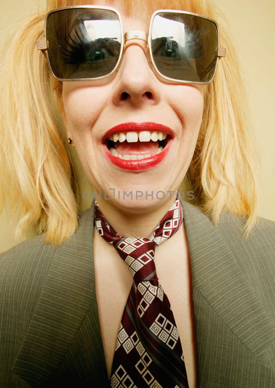 A woman with square glasses