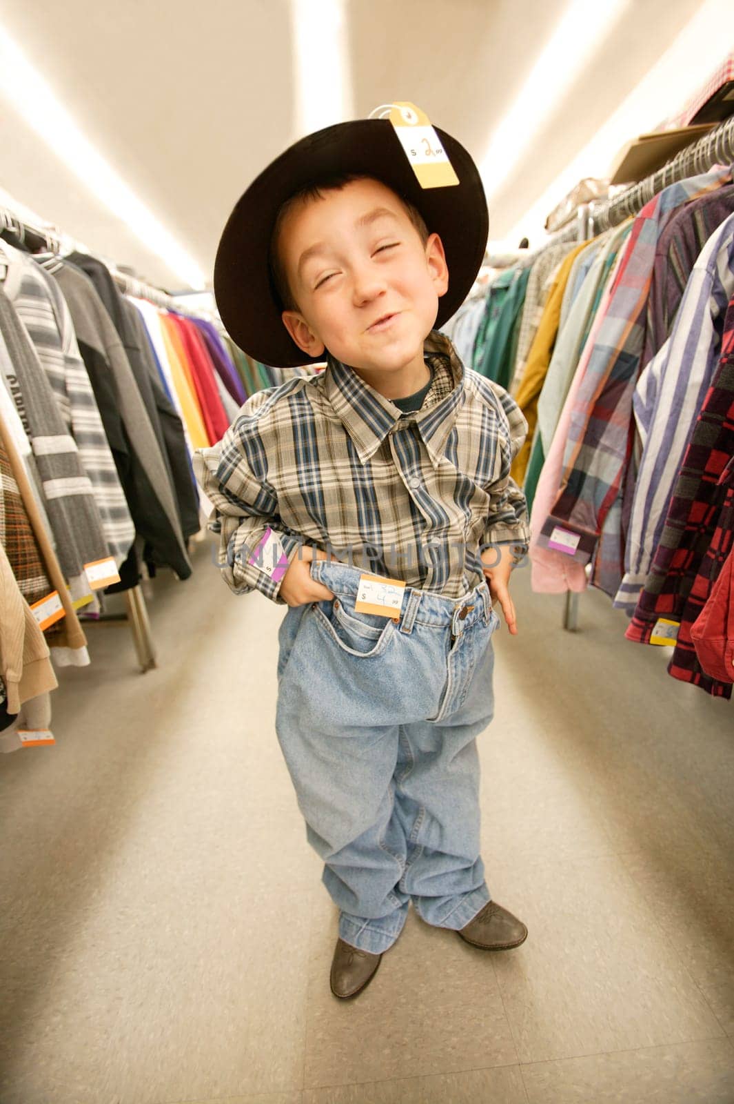 Child tries on clothes