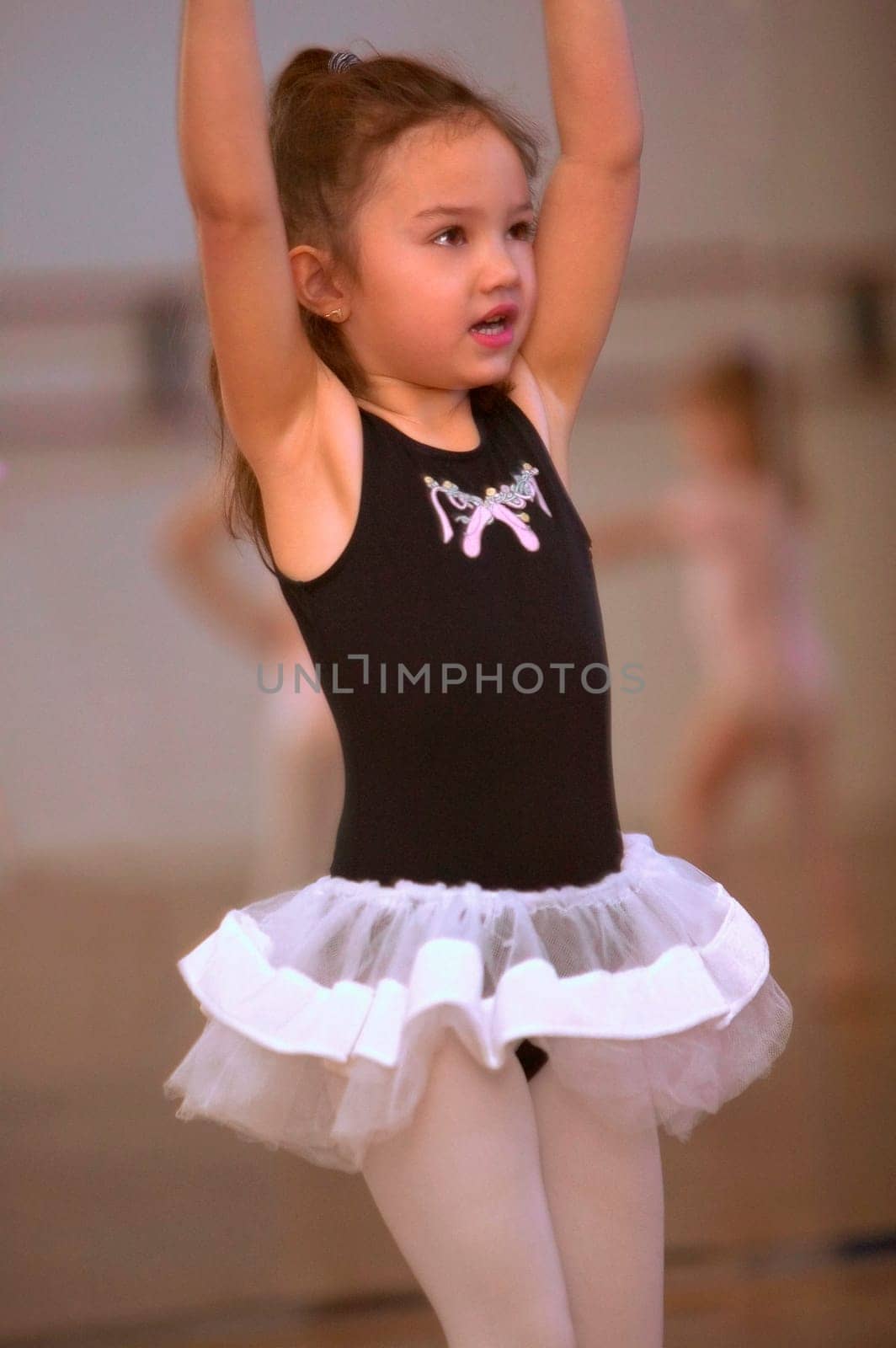 Child practicing ballet