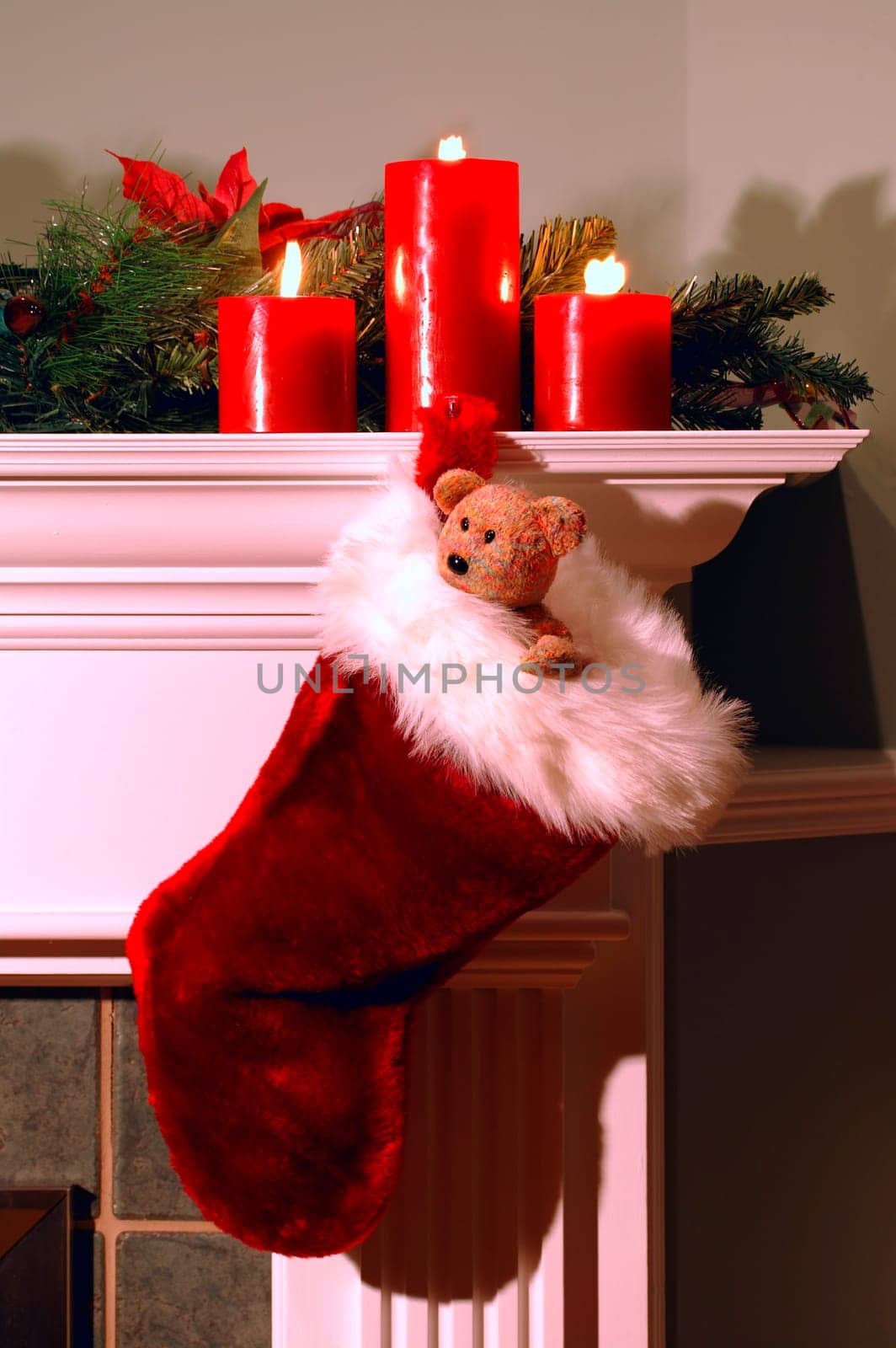 Christmas stocking hanging from fireplace mantle