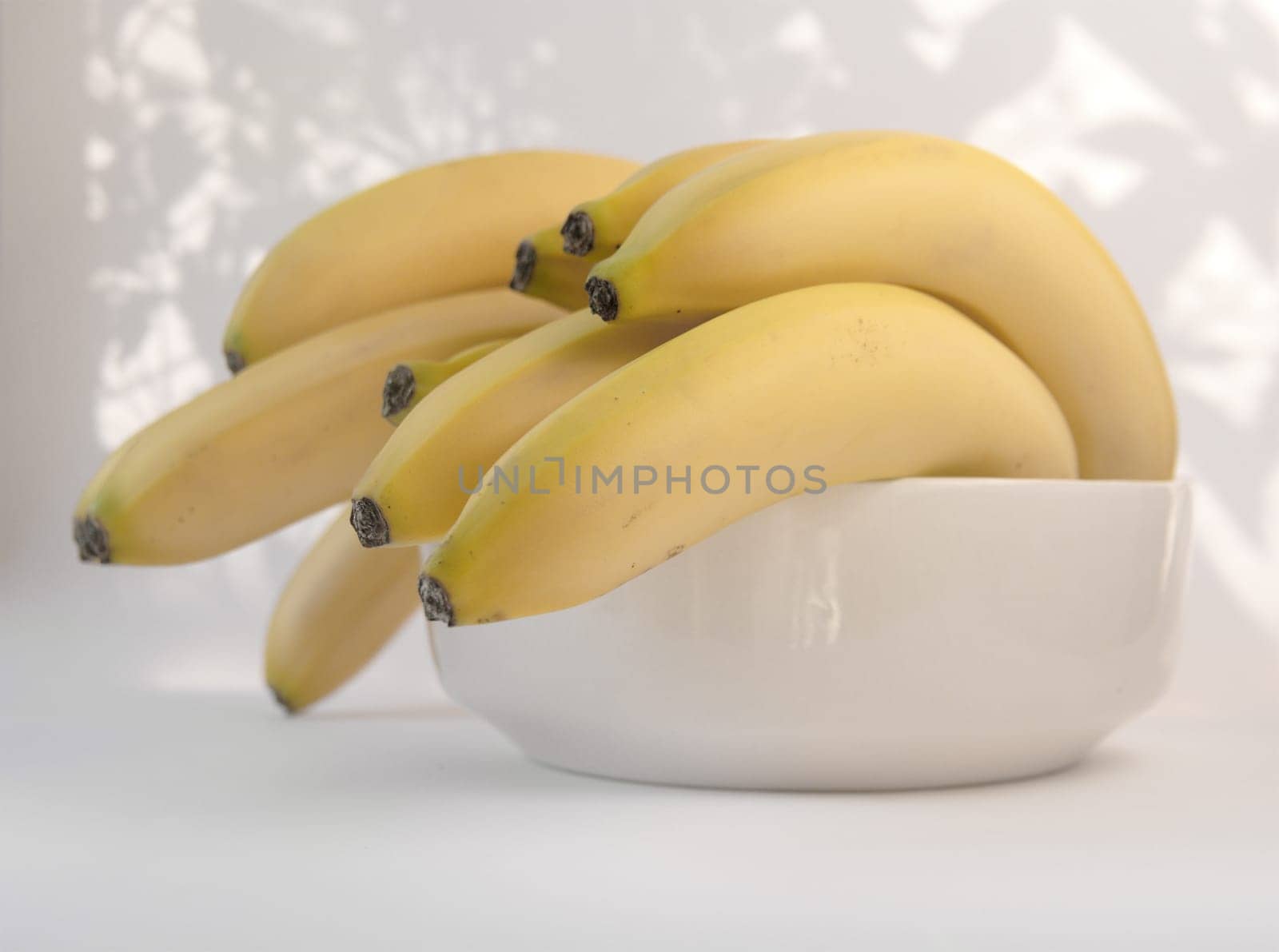 bananas in a white bowl