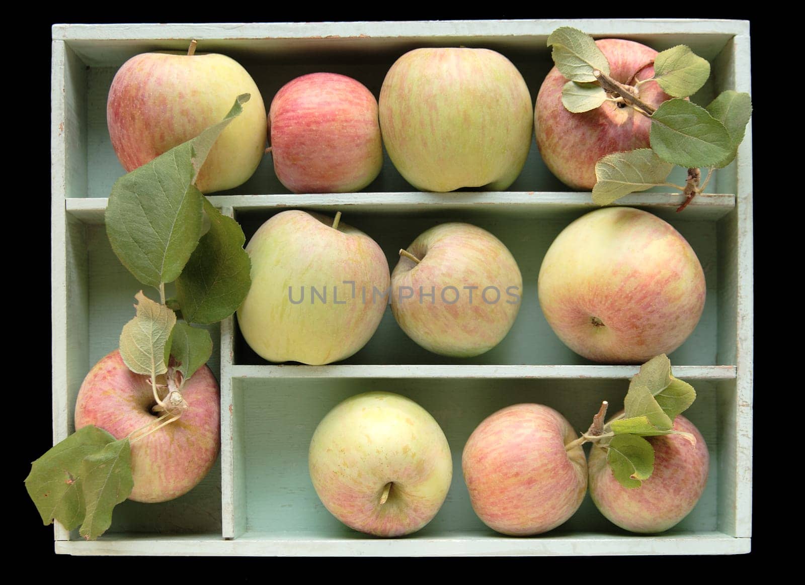 Fuji apples in a wood box