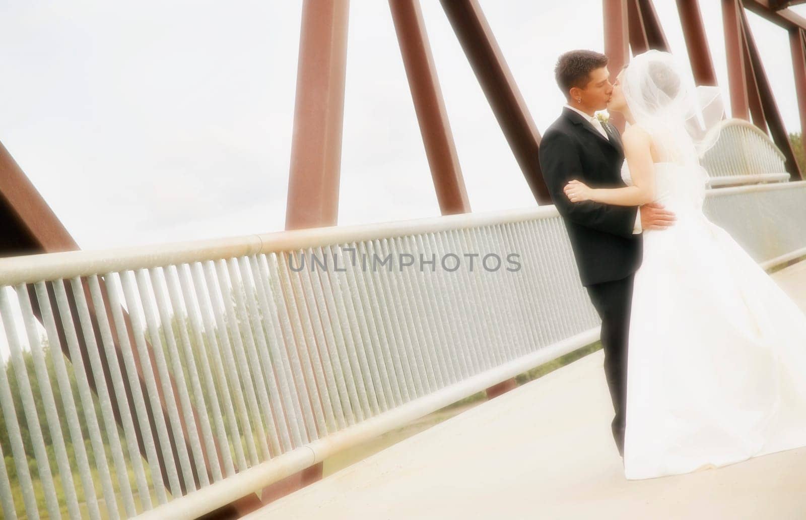Bride and groom kiss