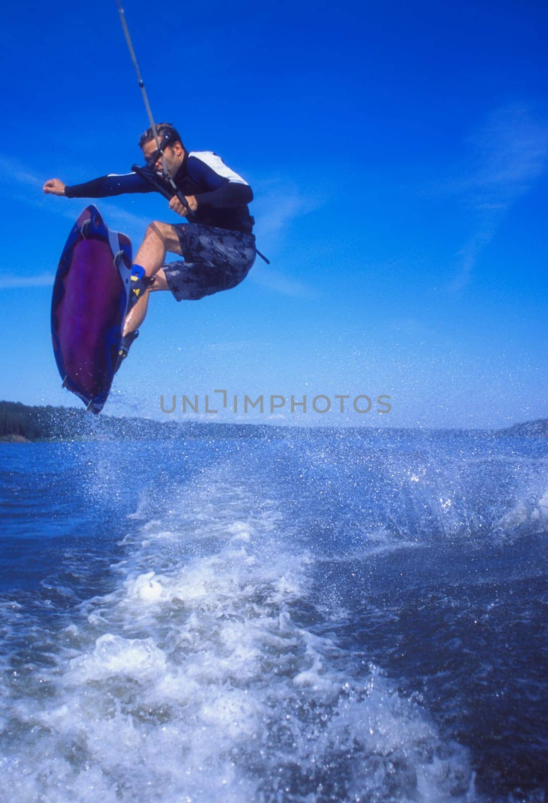 A wake boarder jump