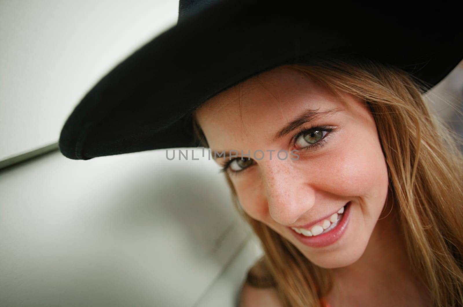 A smile and a hat