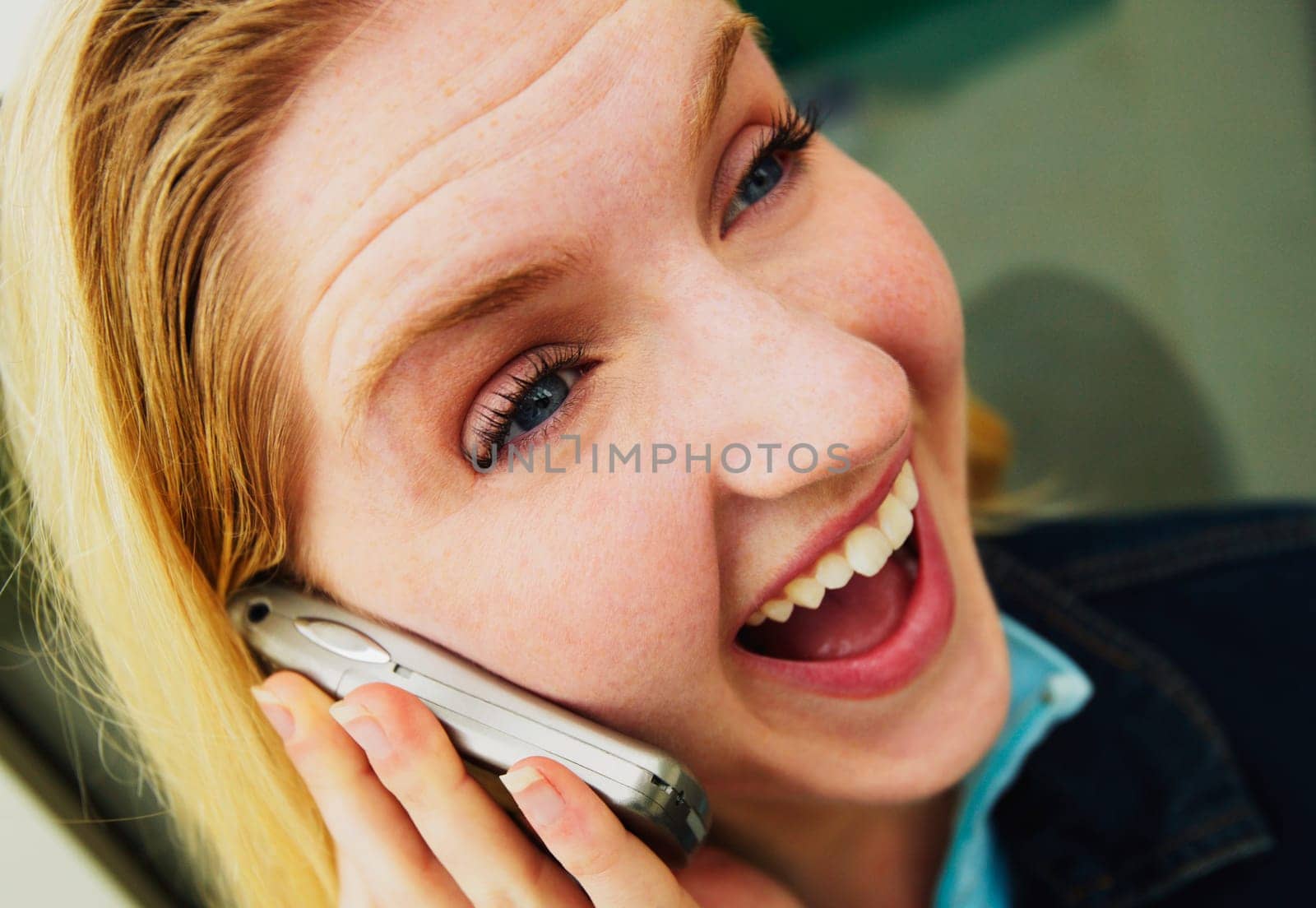 Teen talks on cell phone