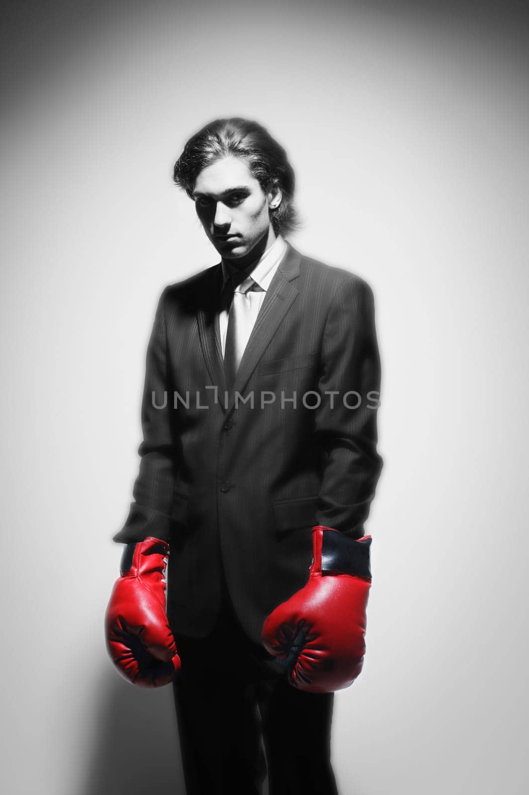 Businessman with boxing gloves