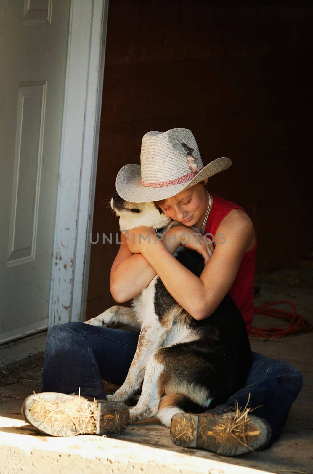 Girl hugging her dog