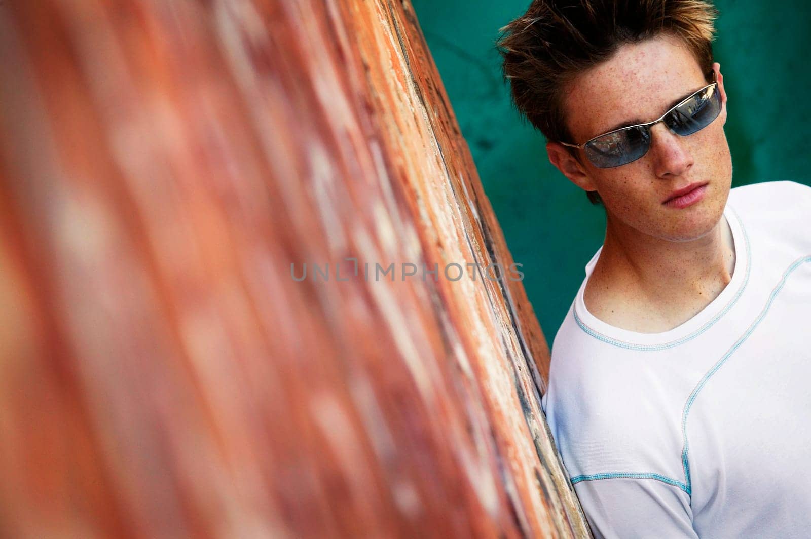 Teenage boy with a model's attitude