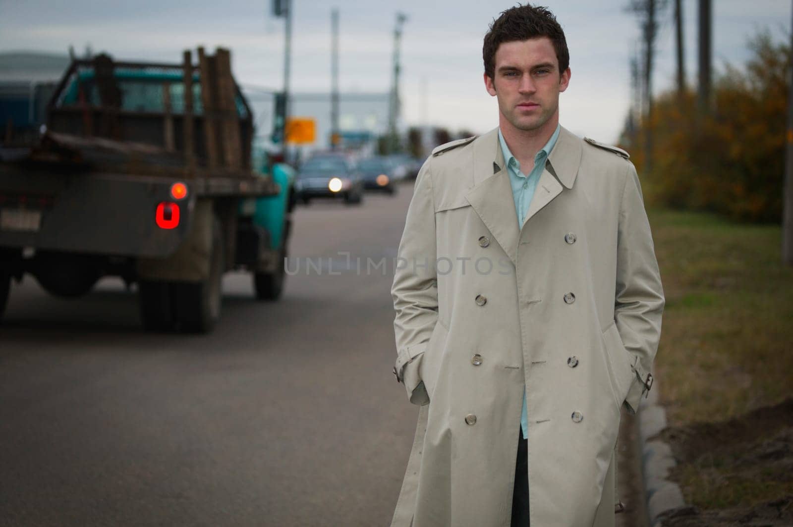 Business man on the side of the road