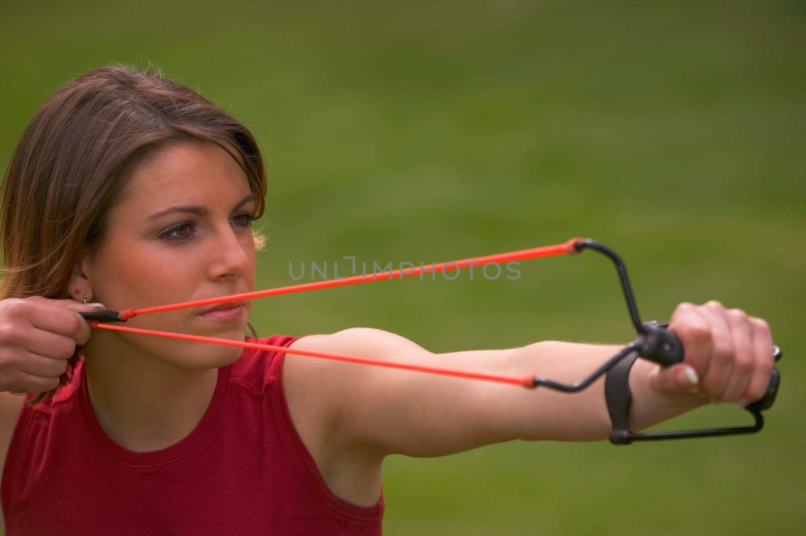 Woman with slingshot