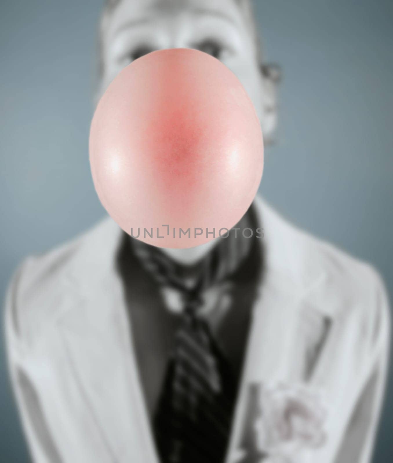 Blowing a bubble in a suit