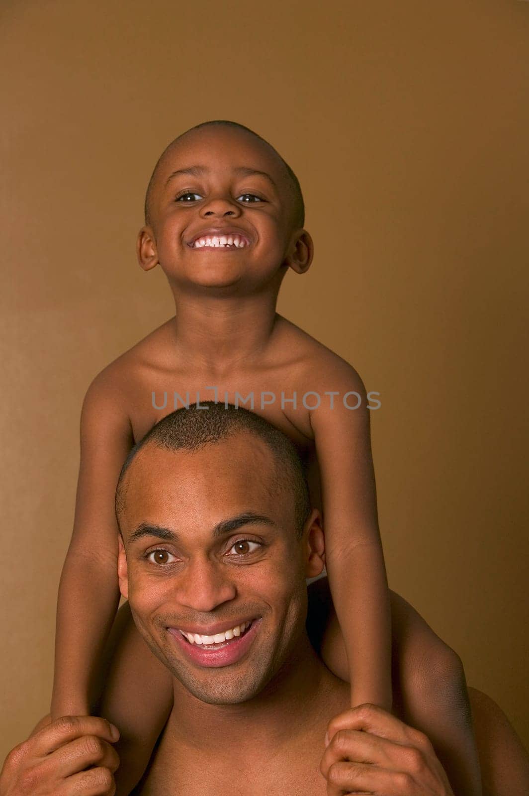 Son on father's shoulders