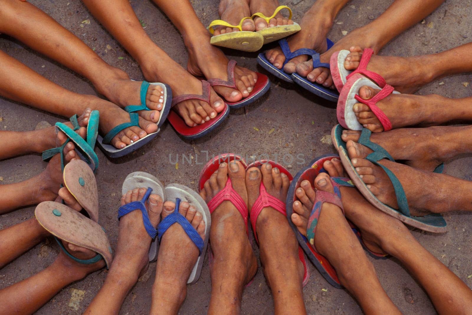 Group of feet in sandals