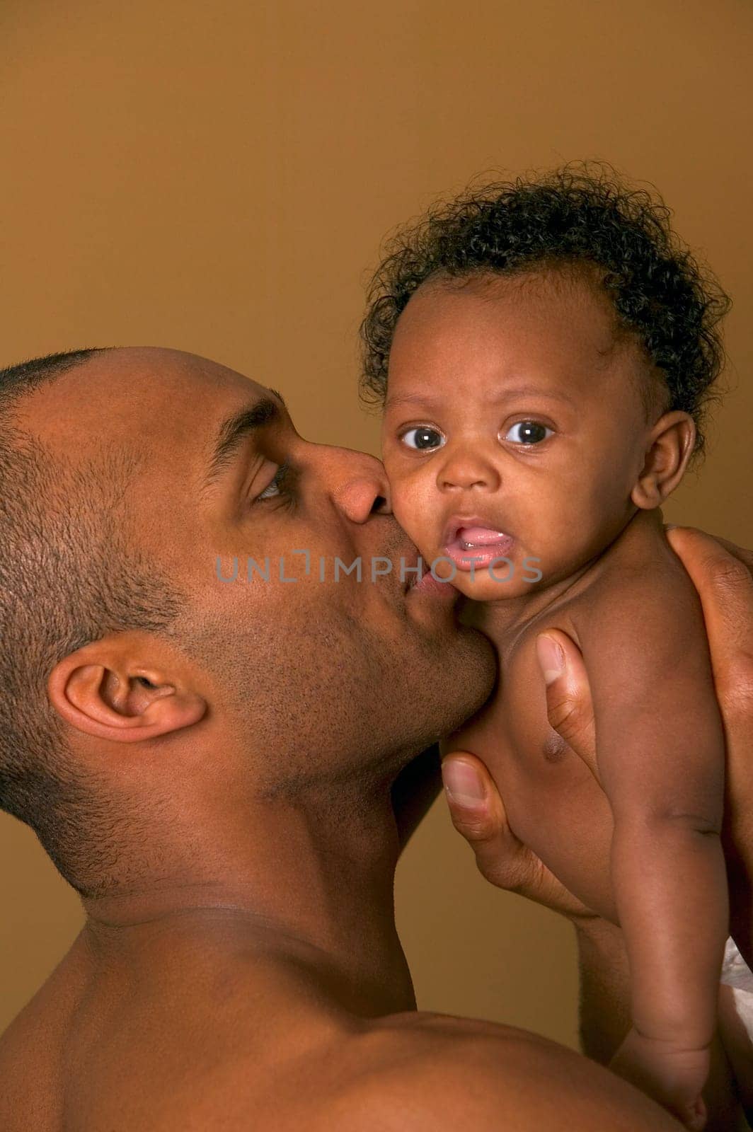 Father holding baby