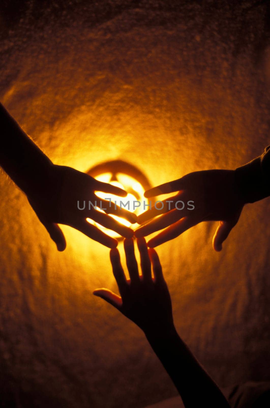 Hands over light