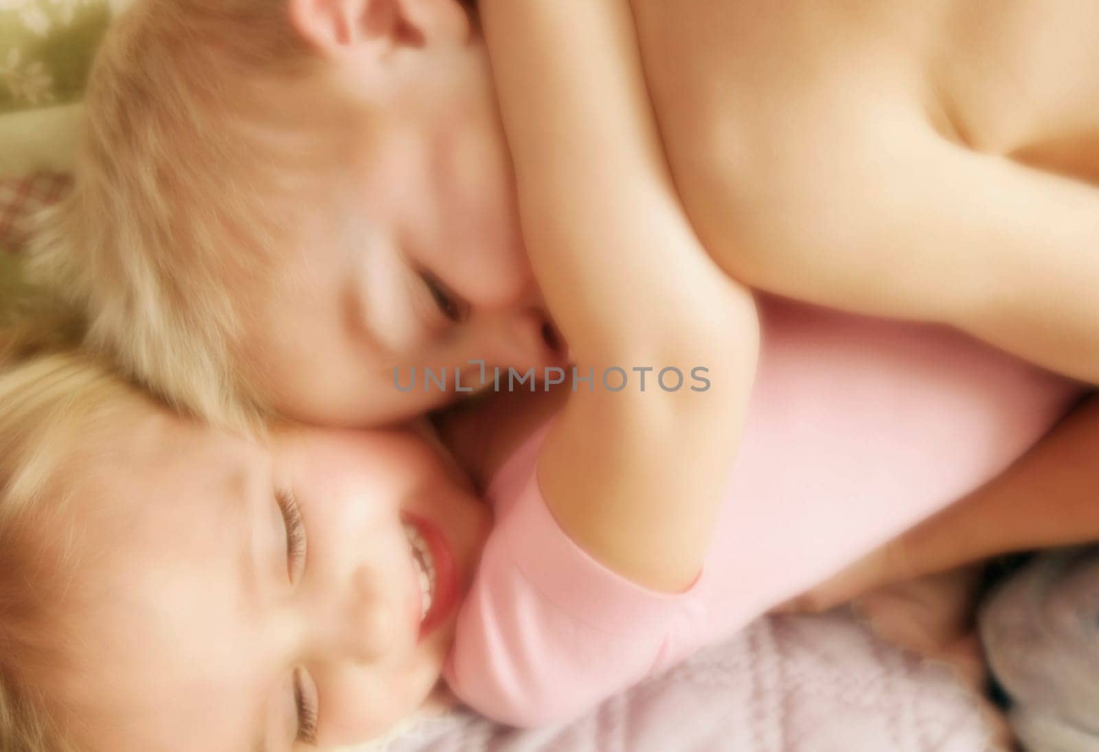 Two children hugging