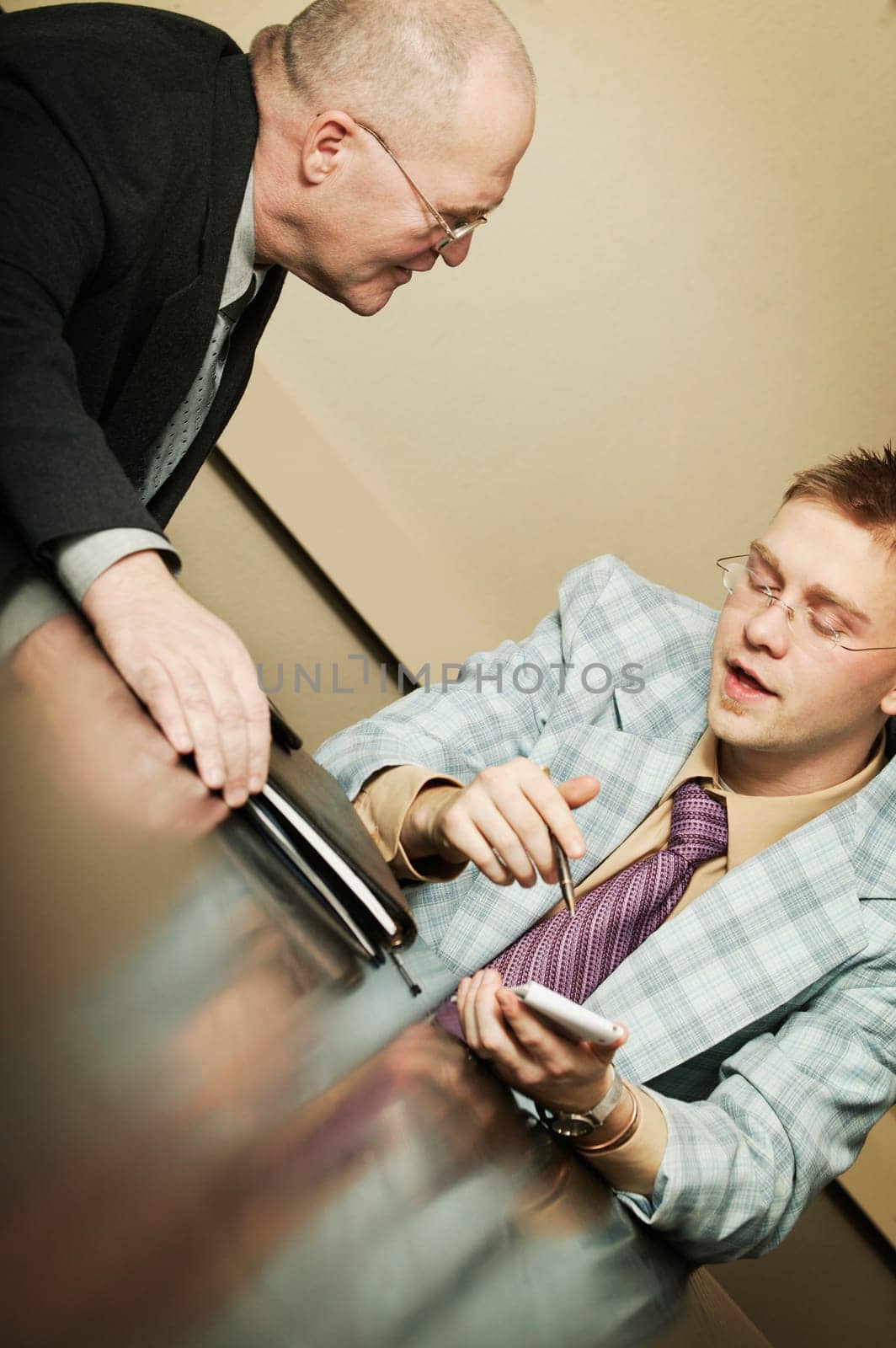 Two businessmen having a discussion