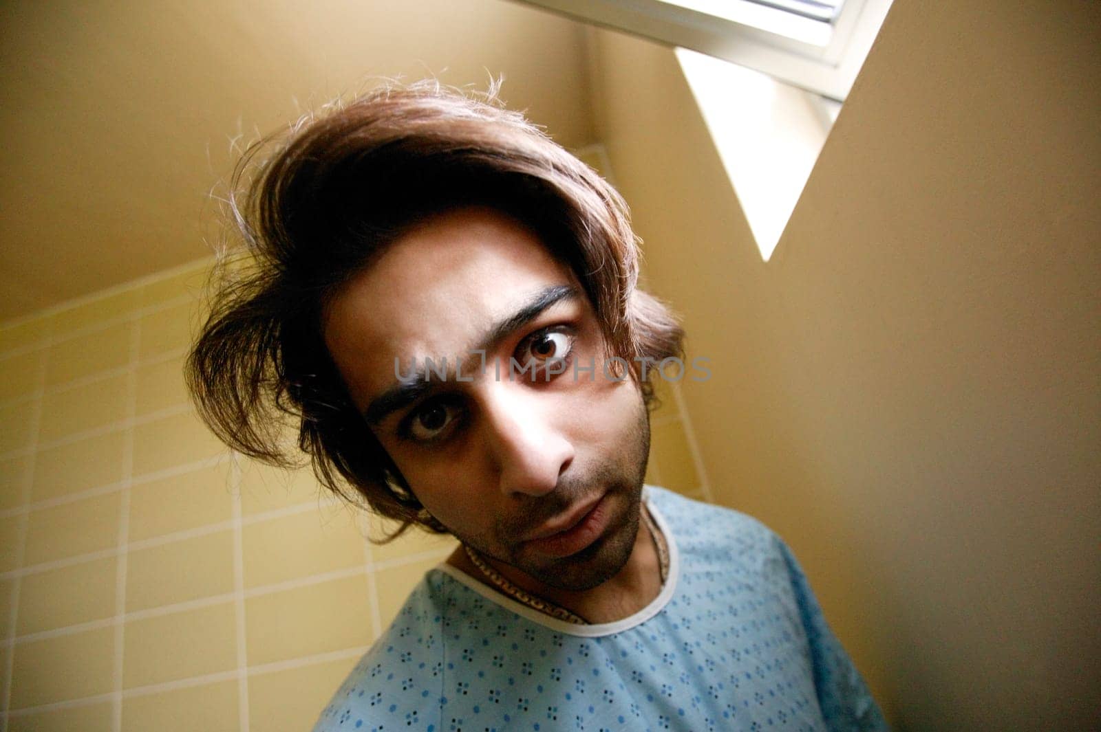 Man in hospital gown