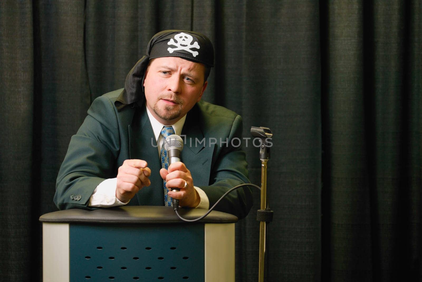 Businessman wearing pirate headgear
