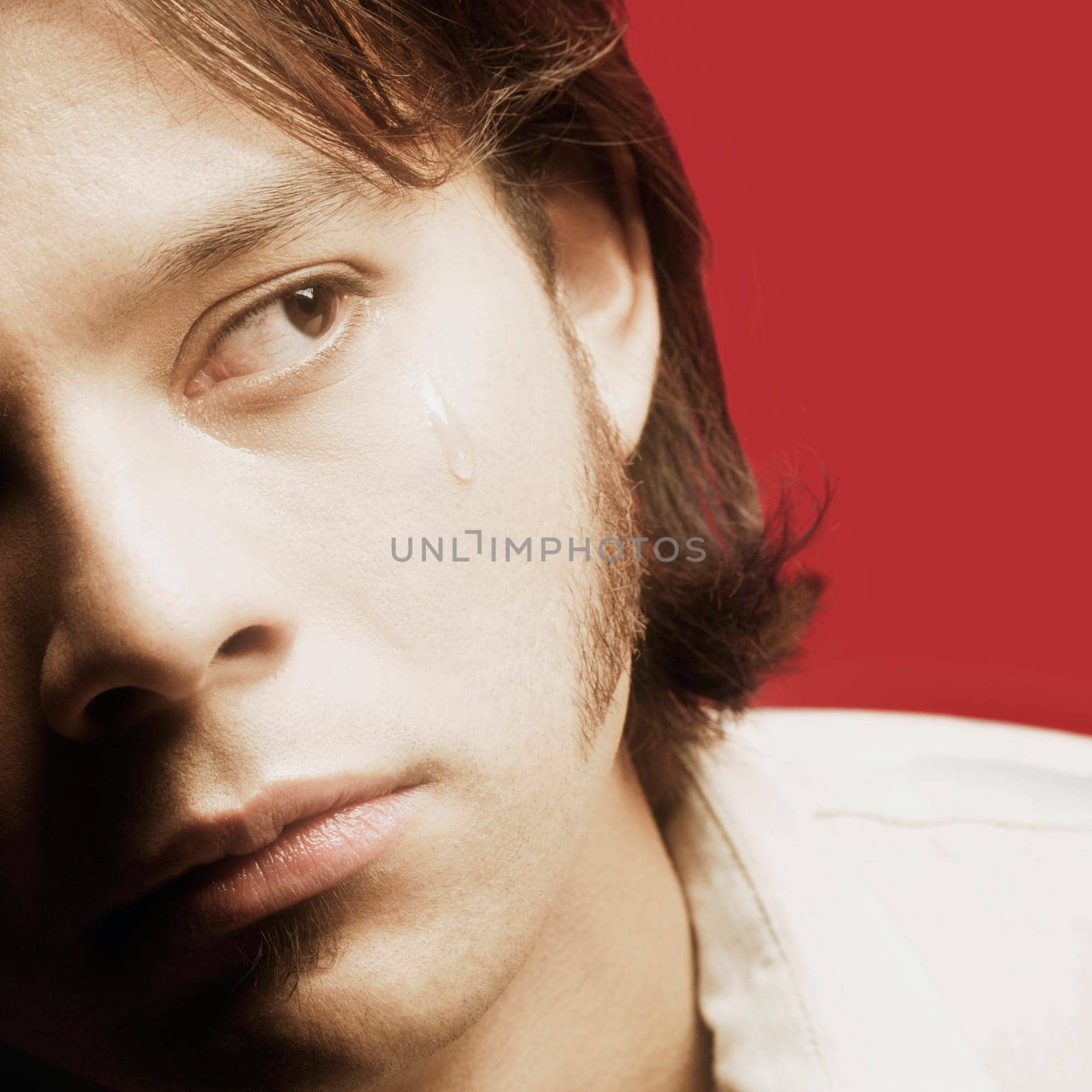 A young man's teardrop