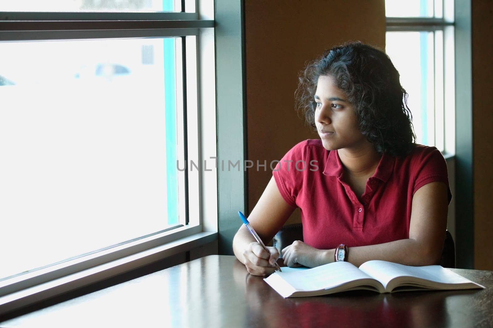Student staring out the window