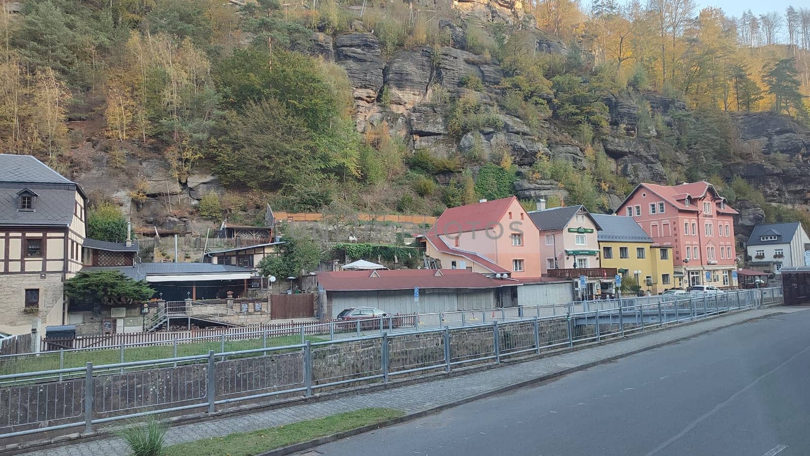 Colourful hillside village hotel apartment nature travel tourism summer day park autumn road Hrensko Czech Republic Europe . High quality photo