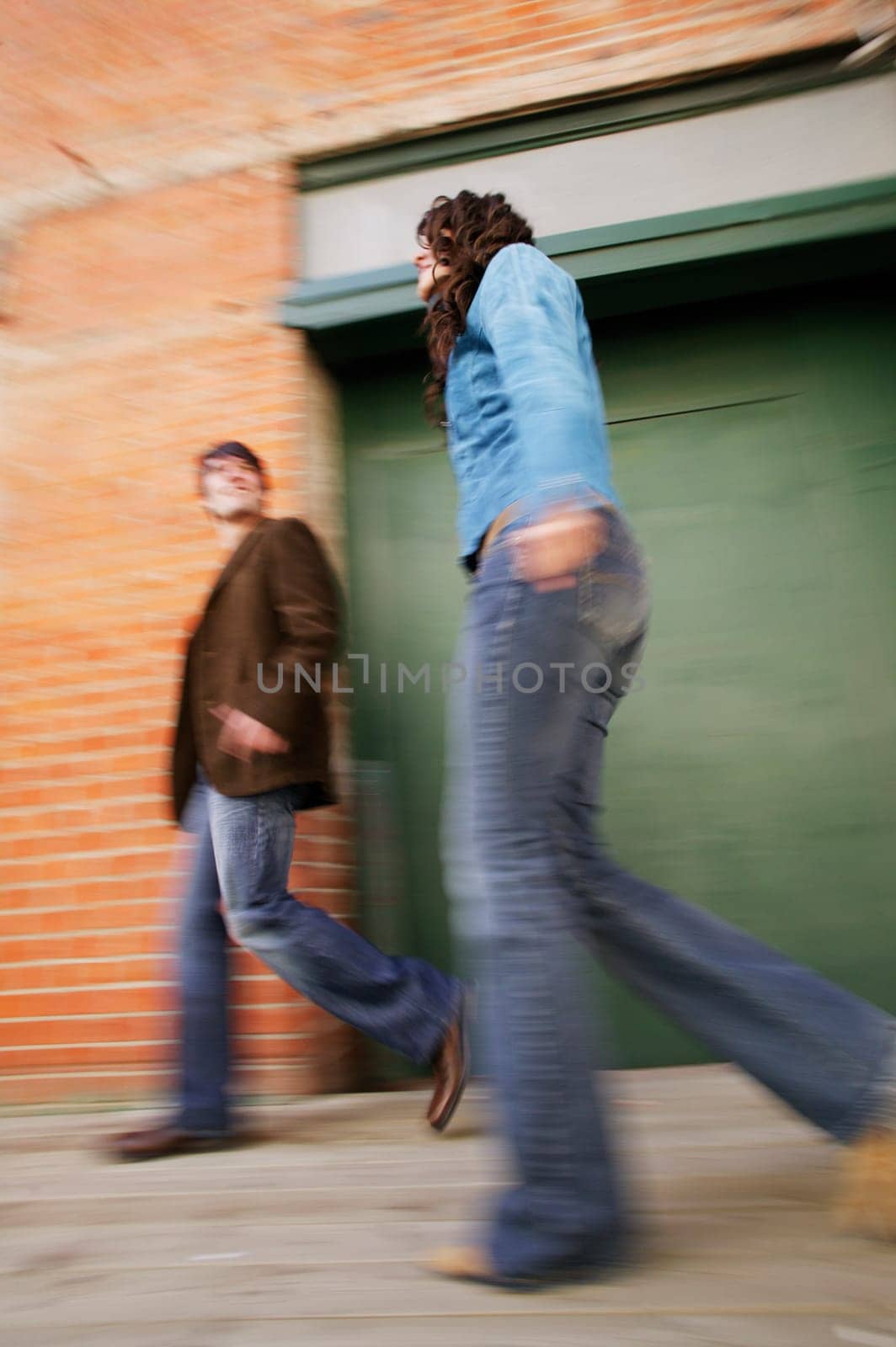 Couple walking on pavement