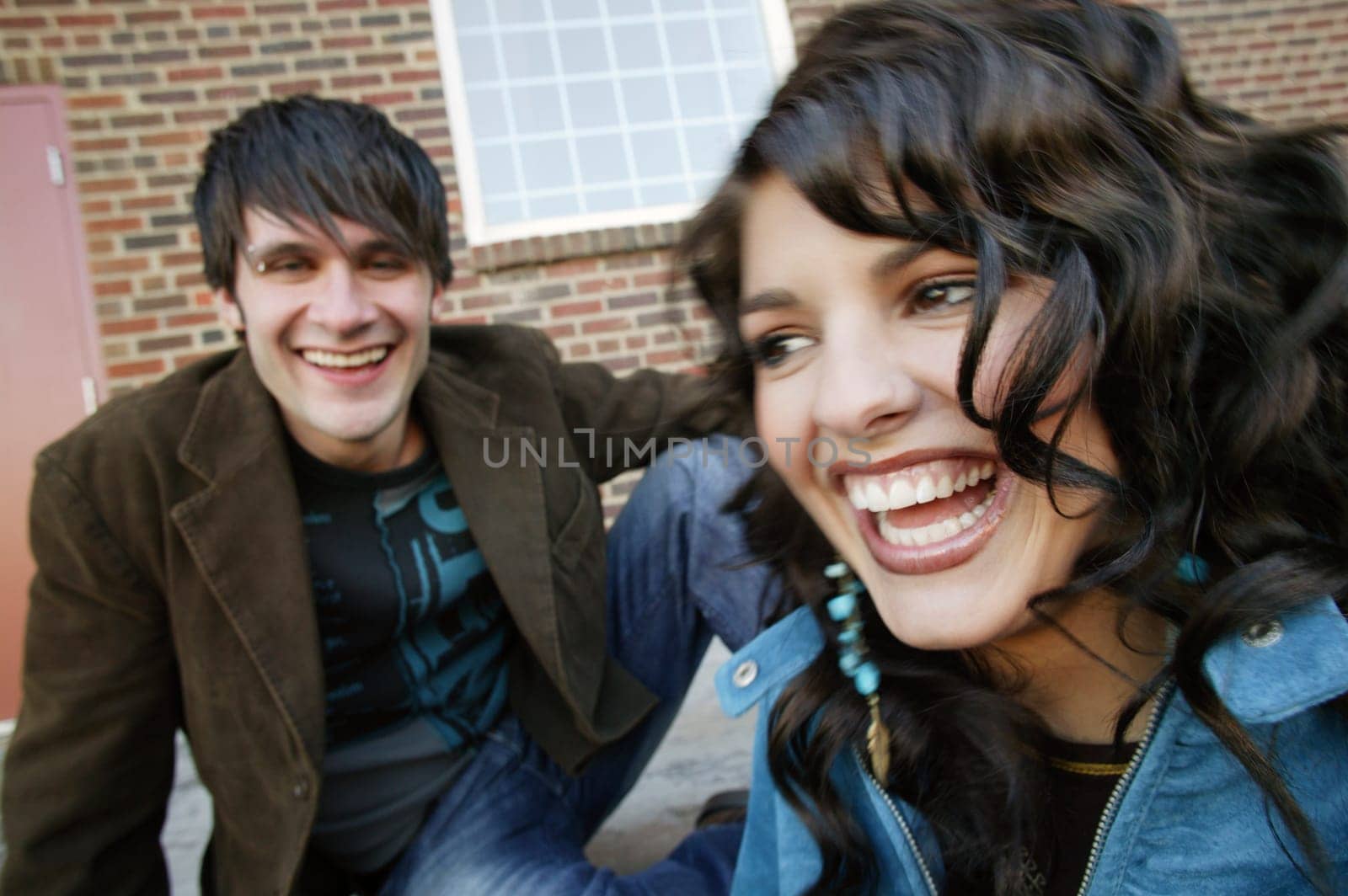 Man and woman laughing together