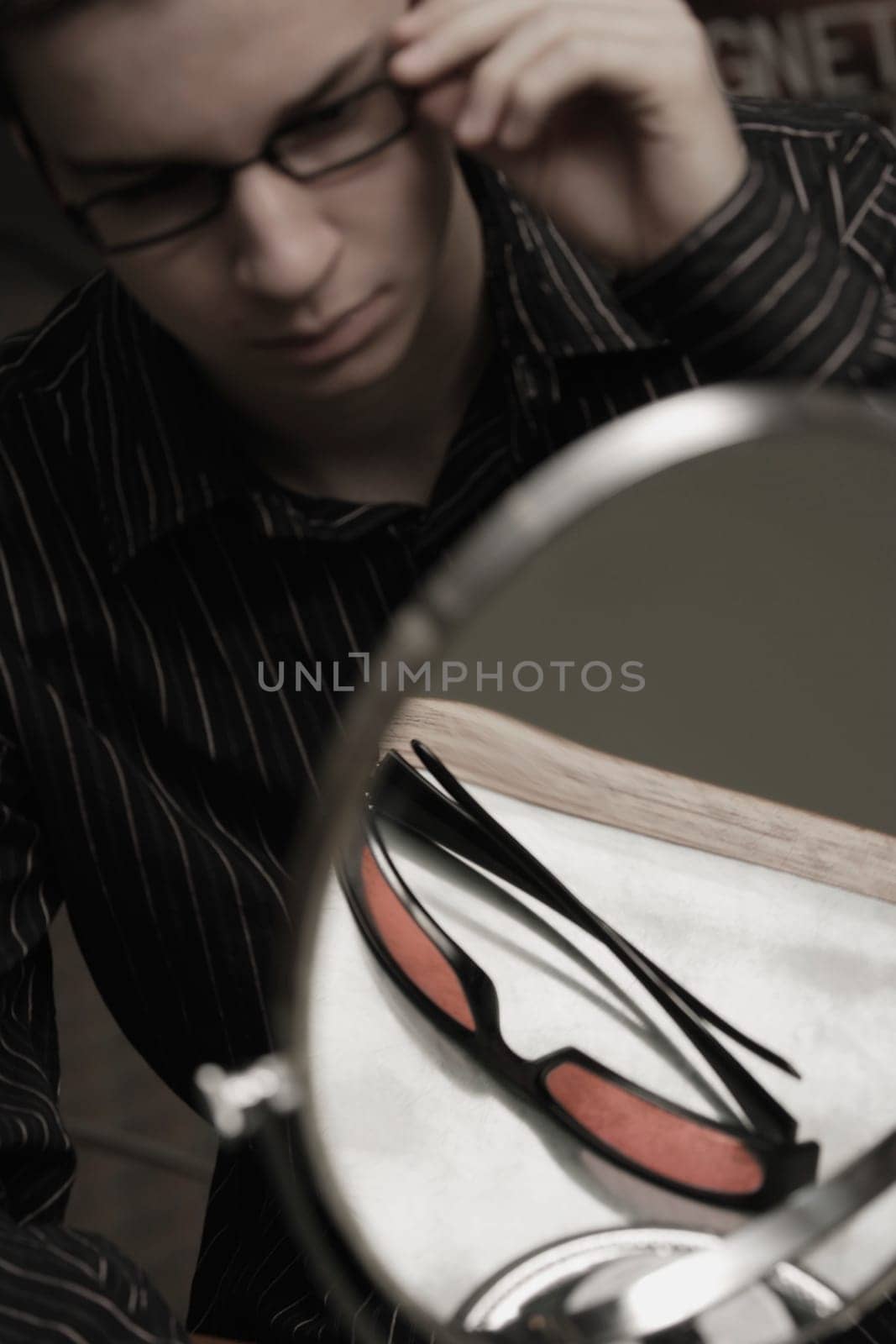 Man trying on glasses