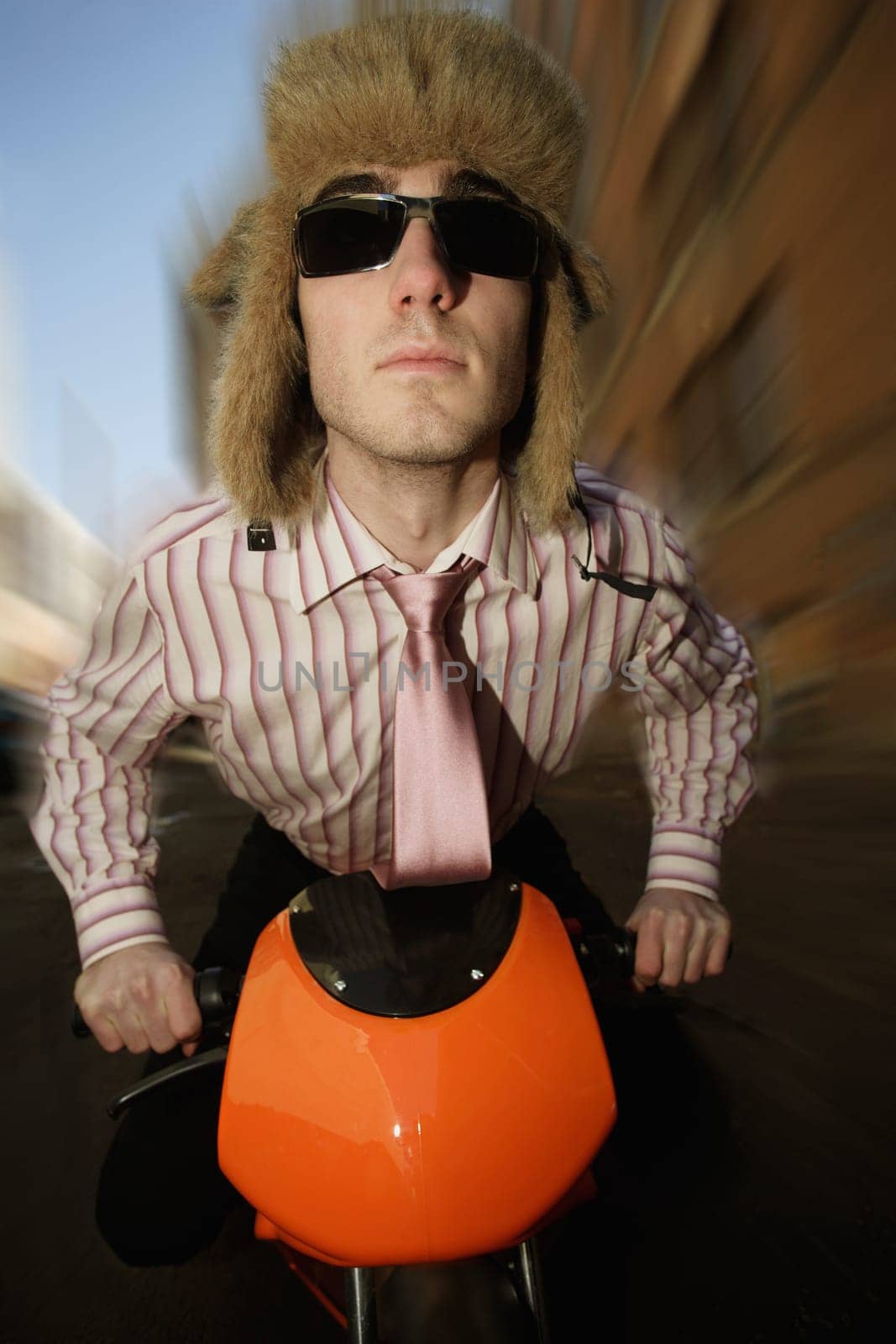 Man on a small motorbike