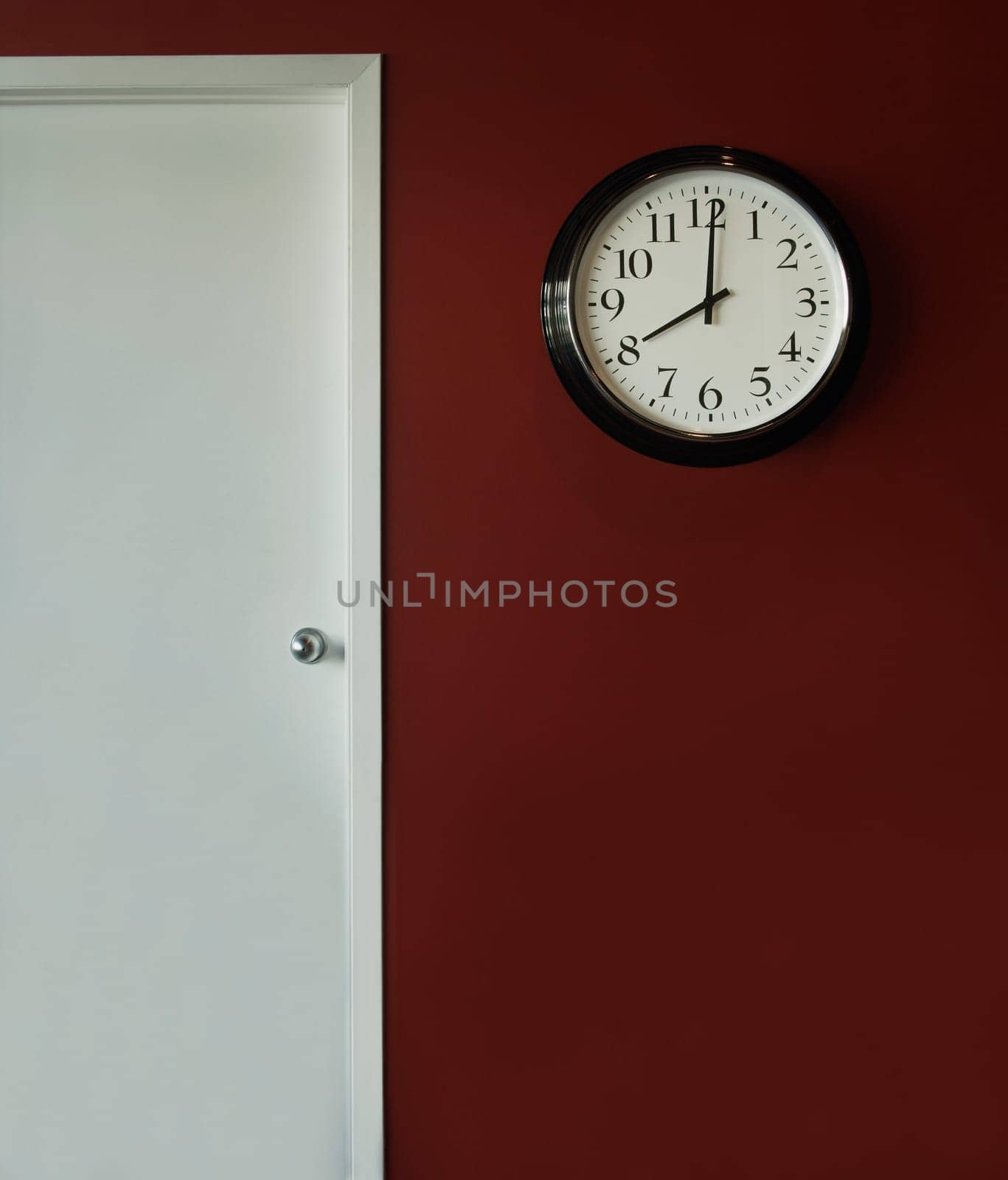A wall clock showing 8 o'clock