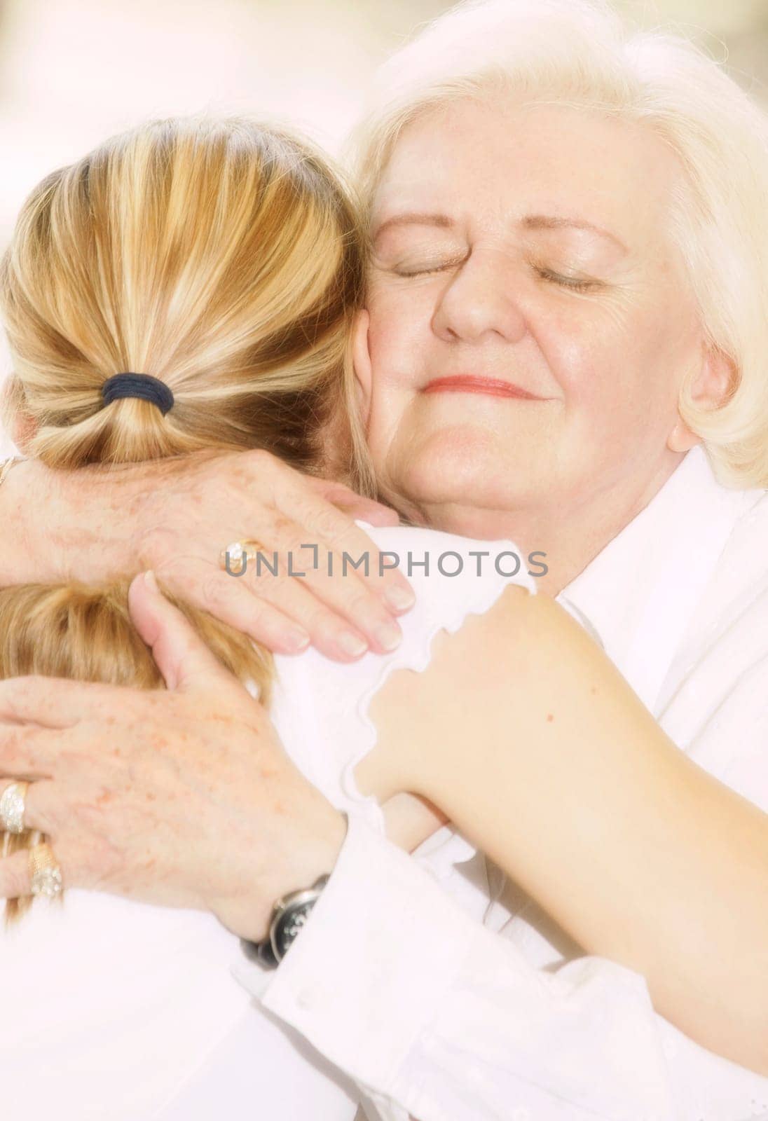 Grandma hugging granddaughter