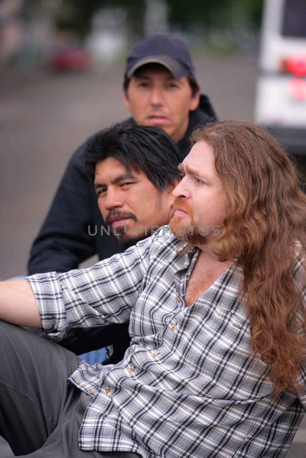 Three men sitting