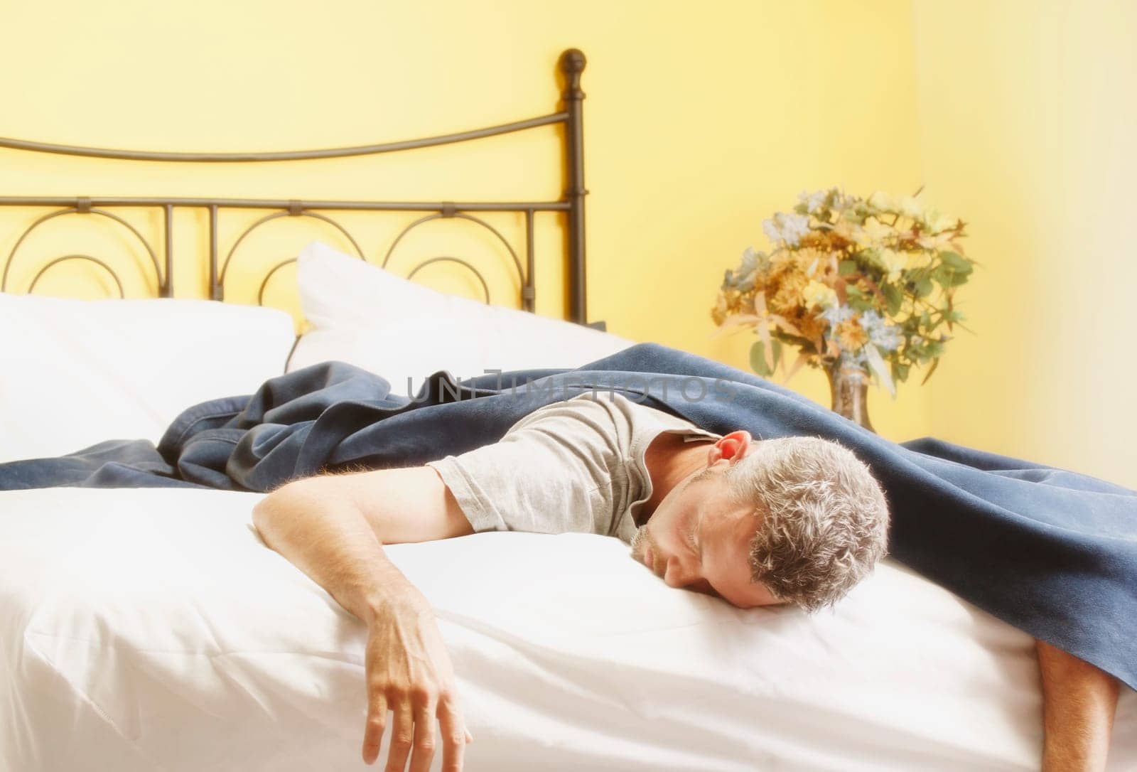 Man sleeping in bed