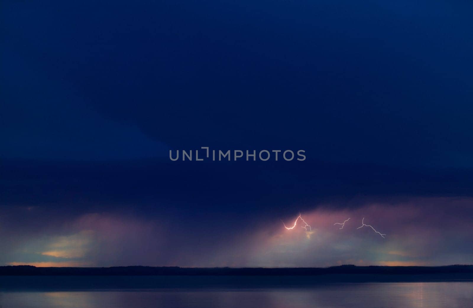 Lightning in sky over water