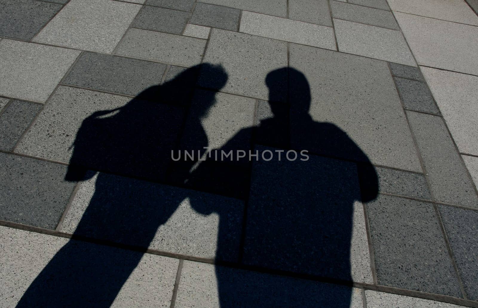 Shadow of two people standing